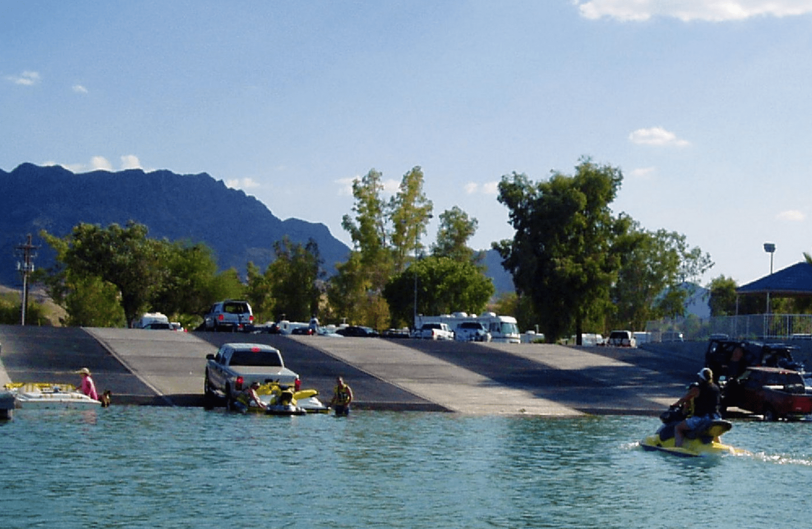 People launching boats into Moabi marina.