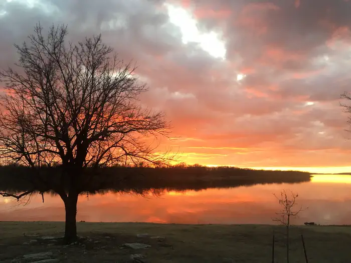 Sunset at over Oologah Lake. View from Blue Creek Campground