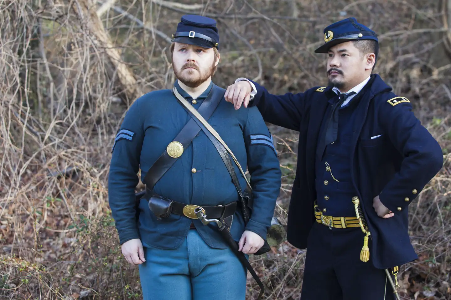 Two rangers dressed in Civil War period costumes