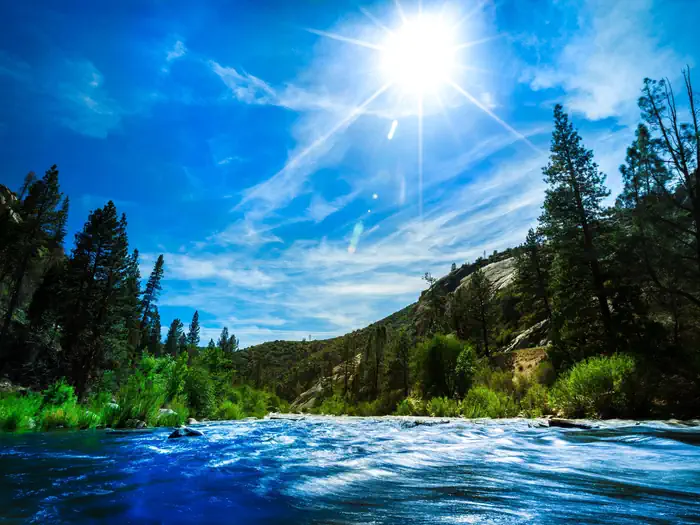 Looking downstream of a river running through the mountains