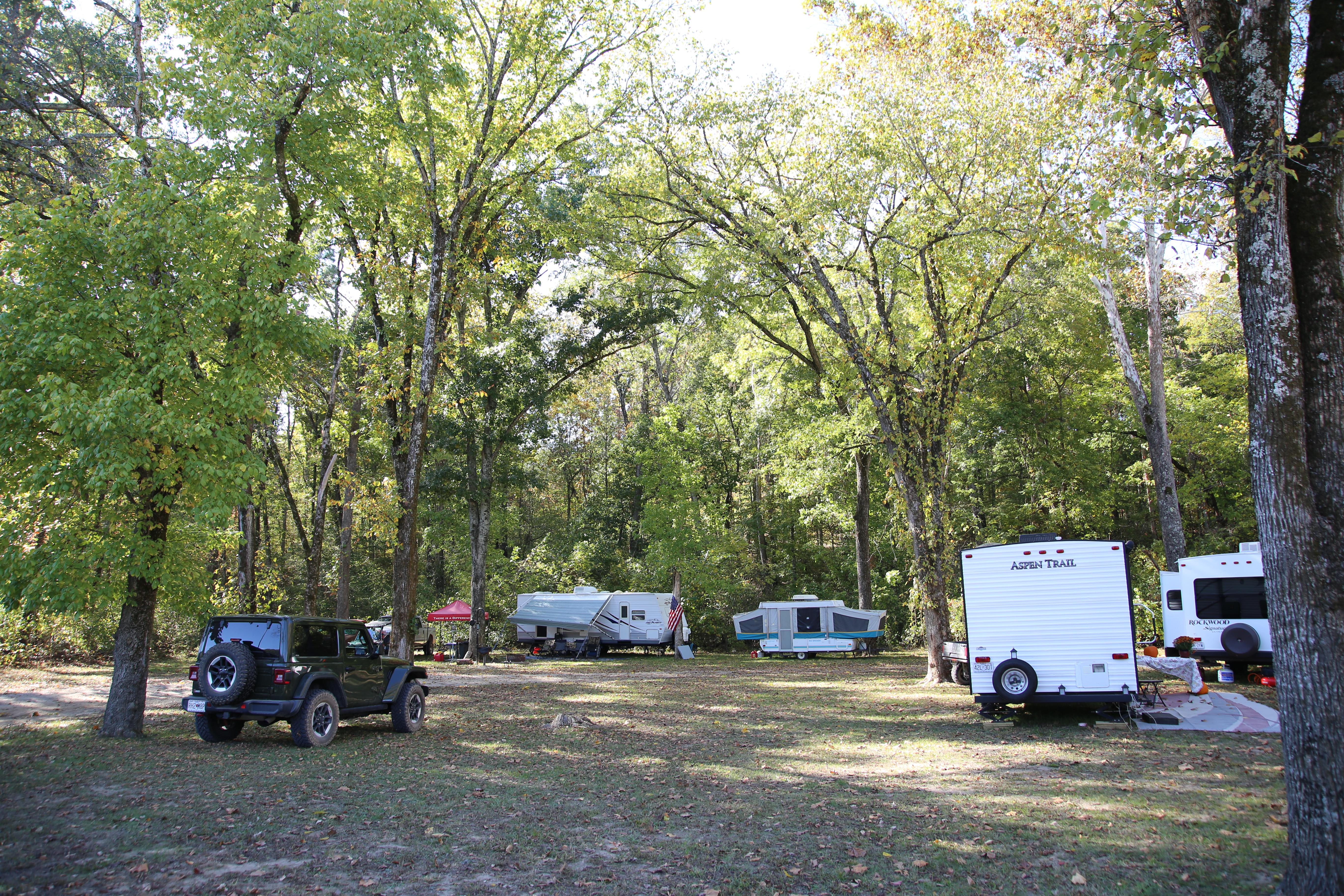 Campers and RVs line a circular drive.