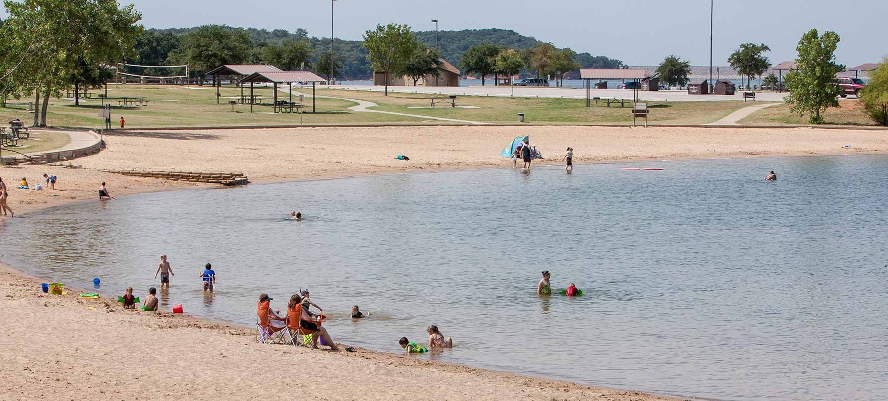 people playing by shore